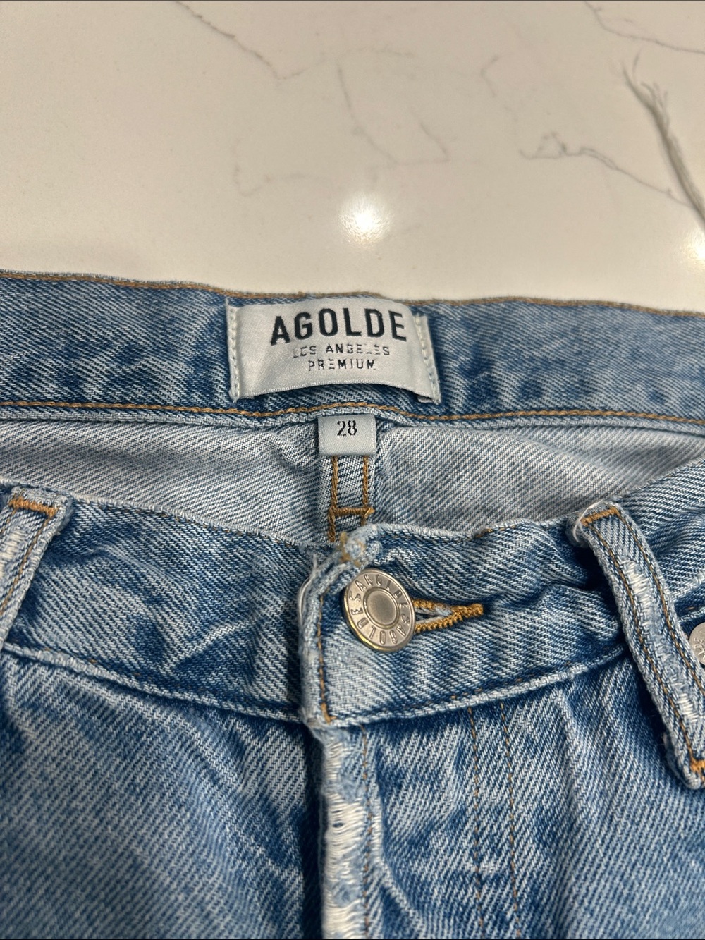 Agolde Light Wash High-Rise Jeans — Faded Blue Denim
